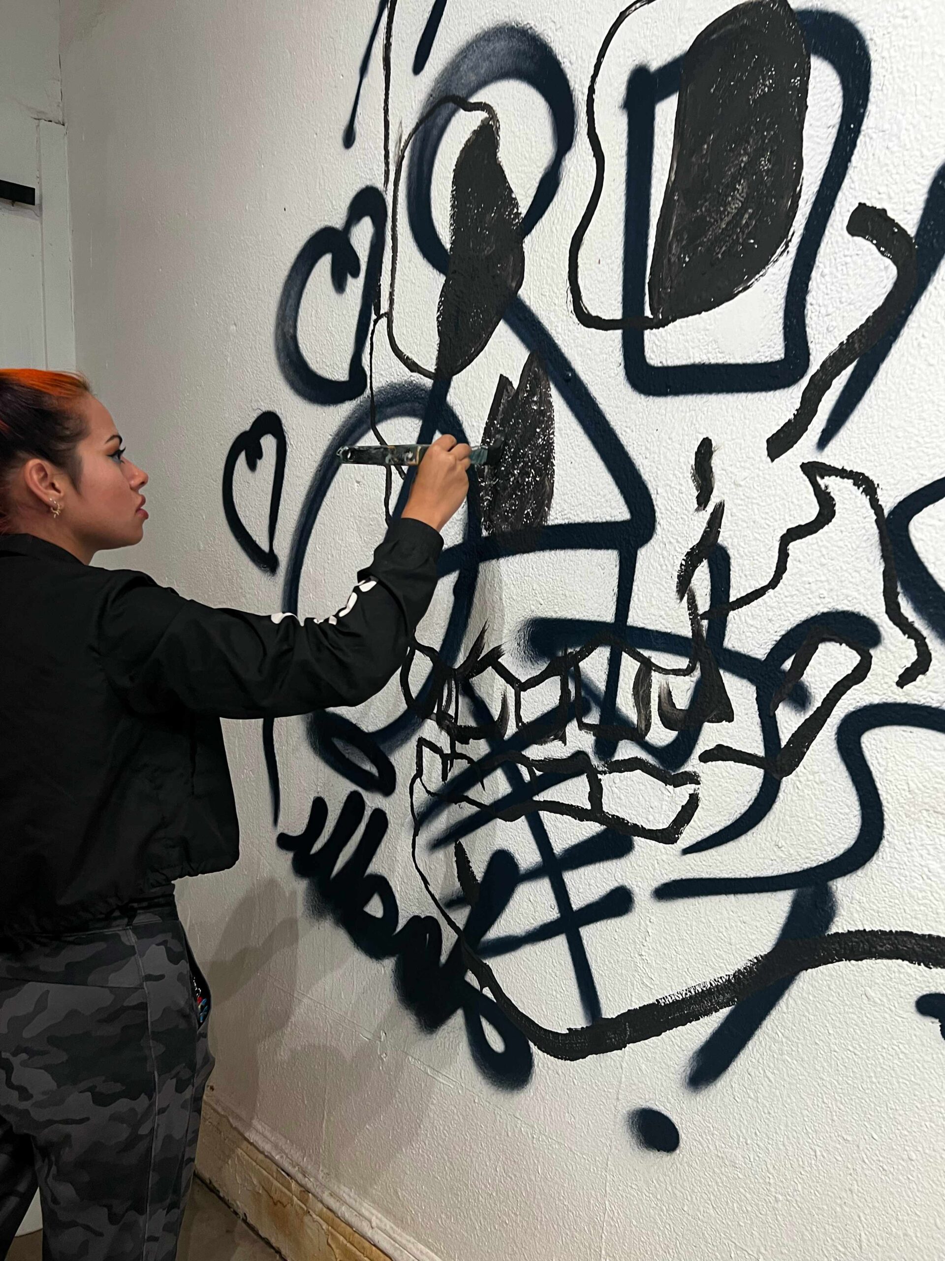 Learn how to paint murals with Mural School by Tampa Walls!